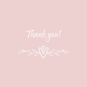 May include: A pale pink background with the words "Thank you!" in white script. Below the text is a white decorative element featuring a heart and leaves.