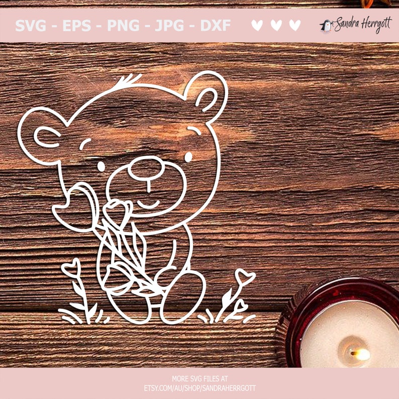 May include: A white line drawing of a cartoon bear holding a bouquet of flowers. The bear is sitting on a wooden surface with a candle in the background.