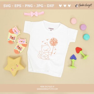 May include: A white baby onesie with a cute line drawing of a cat holding a dandelion. The onesie has a tag that says "carter's 24" on it.