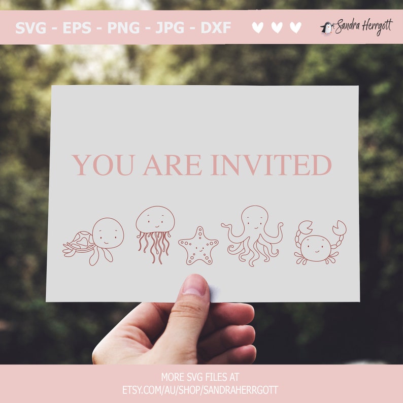May include: A pink and white card with the text "YOU ARE INVITED" in pink.  The card features five illustrations of sea creatures: a turtle, a jellyfish, a starfish, an octopus, and a crab.  The card is being held by a hand.