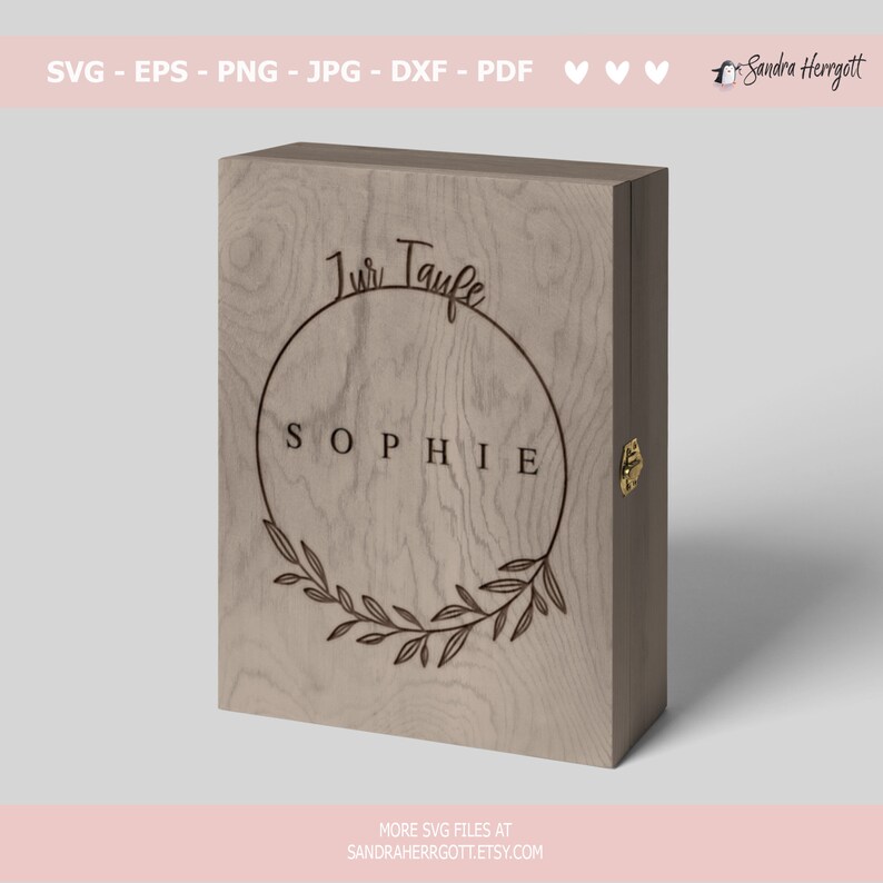 May include: A wooden box with a hinged lid and a brass latch. The box is engraved with the text "1. Jun Taufe" in a circle with a floral wreath design. The name "Sophie" is written below the circle.