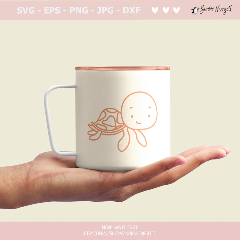 May include: White mug with a copper-colored rim featuring a line drawing of a cartoon turtle with a shell and a smiling face.