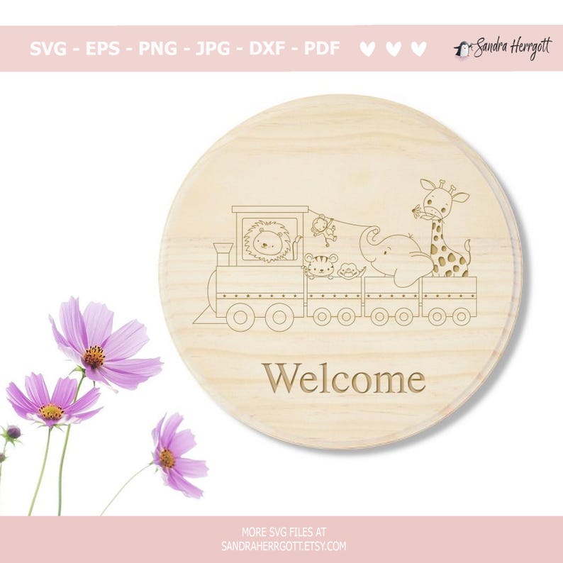 May include: A round wooden sign with a laser-etched train carrying various animals, including a lion, monkey, tiger, elephant, and giraffe. The word "Welcome" is etched below the train. The sign is surrounded by pink flowers.