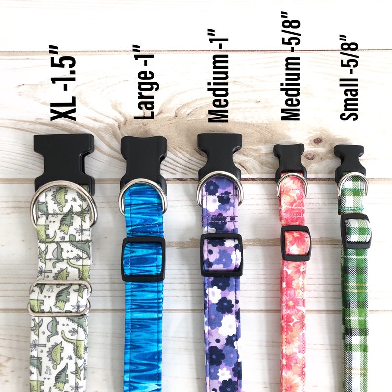 May include: Five dog collars in different sizes and patterns. The collars are made of fabric and have a black plastic buckle. The sizes are XL-1.5", Large-1", Medium-1", Medium-5/8", and Small-5/8".