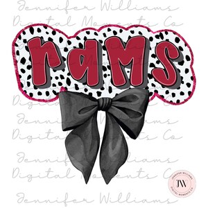 May include: A red and white graphic with the word "RAMS" in a bold, red font. The graphic is surrounded by a black and white dalmatian print. A black bow is below the graphic.
