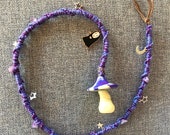 Purple dreadlock wrap with mushroom