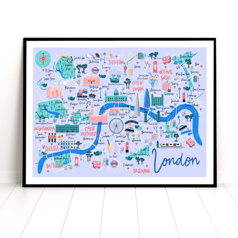 May include: A colorful illustrated map of London, England, with the River Thames winding through the center. The map highlights various landmarks and neighborhoods, including Buckingham Palace, the Houses of Parliament, and the London Eye. The map is framed in a black frame.