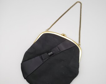 black purse with bow