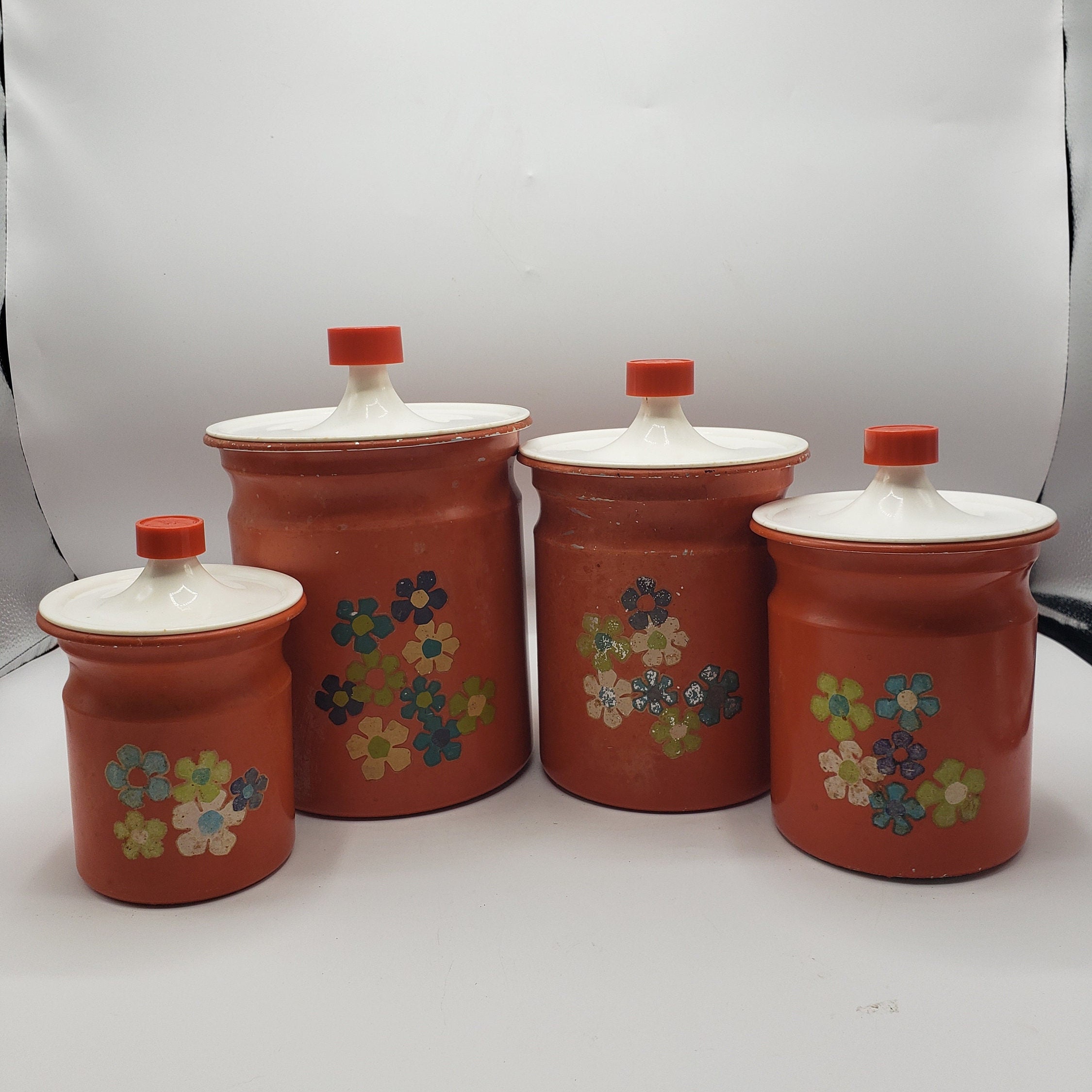 5 piece stackable Kromex silver canisters with black label and handle