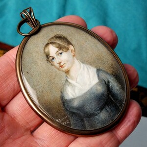 Fine Quality Antique Georgian Portrait Miniature Of A Blue Eyed Lady With Stunning Hair Panel Back - Dated 1813