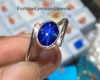 Blauer Sternsaphir-Edelstein-Ring. Ring aus massivem 925er-Sterlingsilber. Handgefertigt. Steingröße: 9 x 7 mm. Top-Farbe. Blauer Stern-Saphirring von seltener Qualität