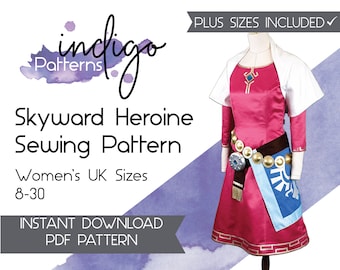 Peut inclure: Une robe rose avec une capelette blanche, une ceinture dorée à accents circulaires et un tablier bleu avec un emblème blanc. Le texte indique : indigo Patterns, Skyward Heroine Sewing Pattern, Women's UK Sizes 8-30, PLUS SIZES INCLUDED, INSTANT DOWNLOAD PDF PATTERN.