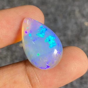Natural Ethiopian Opal Cabochon: Pear Shape Gemstone (24x15x5 MM, 9.50 Carat)
