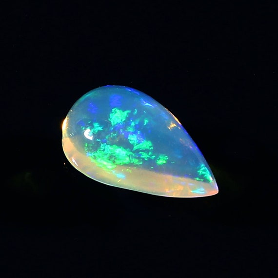 0.95 carat 100% Natural white Ethiopian Opal pear shape | Etsy