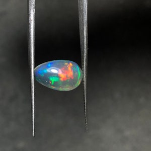 100% Natural Ethiopian Opal Gemstone with top Fire Opal ,Loose Gemstone ,Shape-PEAR ,Size-8.40x13.40MM ,Carat-3.35