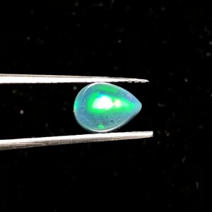 Ethiopian Opal Gemstone with Flashy Fire Opal ,Loose Gemstone ,Shape-Pear ,Size-7X5.80 MM ,Carat-0.65 Approx ,Code-CG-102