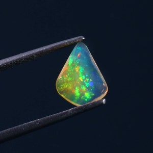 Natural Ethiopian Welo Opal Slice: Faceted Fire Opal Crystal (0.60 Carat)