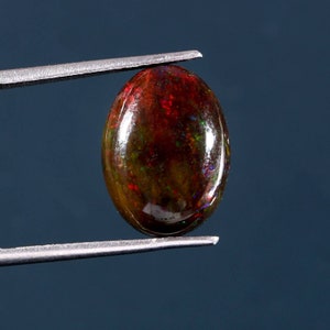 6.25 Carat Black Ethiopian Opal Cabochon: October Birthstone (15.3x11.4x6.8MM)