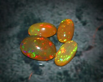 AAA+++ Erstklassiger transparenter brauner Opal, augenrein, natürlicher äthiopischer Opal-Cabochon-Edelstein, Multi-Feuer, Welo-Opal, ovales Lot.