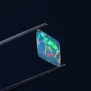 Ethiopian Welo Opal Slice: Faceted Fire Opal Crystal, 0.75 Carat