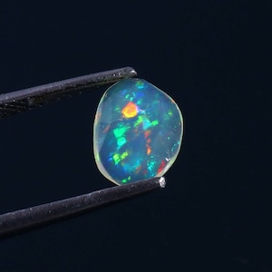 Natural Ethiopian Welo Opal Slice: Faceted Fire Opal Crystal (0.60 Carat)
