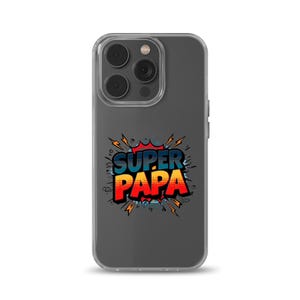 May include: A clear smartphone case featuring a comic book style graphic with the text SUPER PAPA in bold blue and red letters. The design includes a stylized explosion effect with yellow lightning bolts and a dotted texture background.