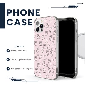 May include: A pink phone case with a white bunny rabbit pattern. The case has clear, unprinted sides and a TPU gel that absorbs impact.