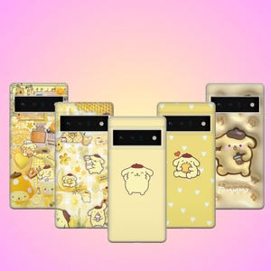 May include: A collection of yellow phone cases with various designs featuring a cartoon dog character. The cases have different patterns, including hearts, food, and other illustrations. The cases are displayed against a pink background.