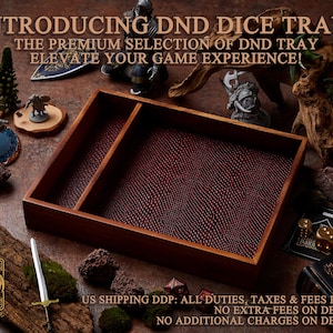 May include: A wooden DND dice tray with a burgundy textured interior. The tray is divided into two sections. The text "INTRODUCING DND DICE TRAY" is at the top. The tray is surrounded by miniature figurines and dice.