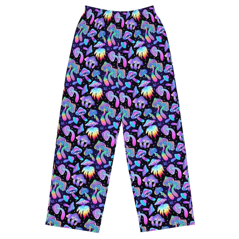 May include: Black trousers with a psychedelic print of colourful mushrooms. The mushrooms have rainbow colours and are on a black background.