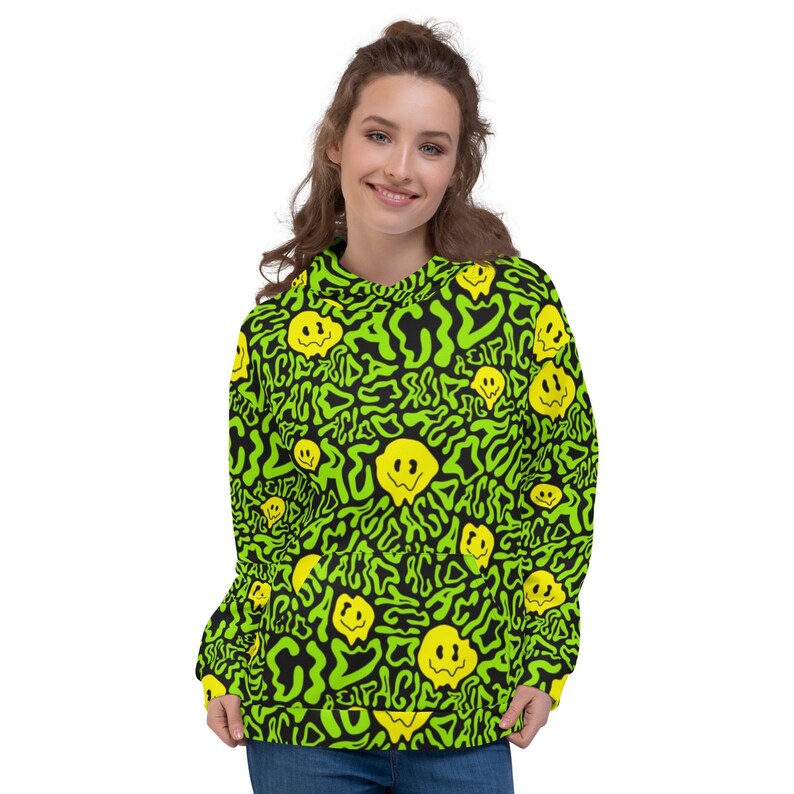 May include: A green and black hoodie with a repeating pattern of yellow smiley faces and the word "acid" in a wavy, psychedelic font.