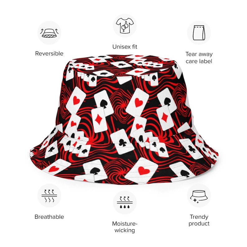 May include: A black bucket hat with a red and white playing card pattern. The hat has a wide brim and a flat crown.