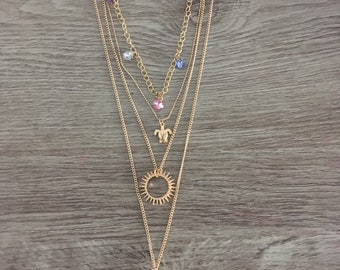 Collier multirang doré strass soleil corne blanche tortue ethnique boho chic