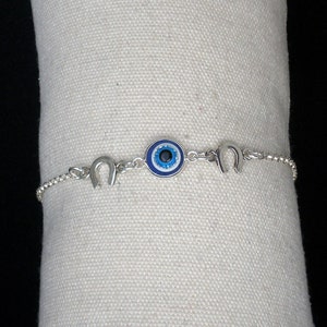 Silver evil eye bracelet, Lucky horseshoe bracelet, Adjustable bracelet, Sterling silver bracelet