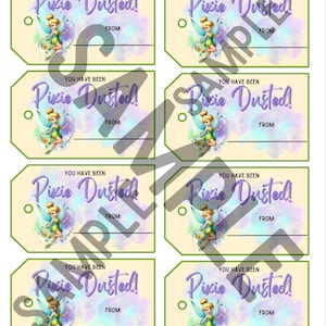 May include: Eight rectangular gift tags with green borders, each featuring a cartoon fairy with blonde hair and green wings. The text reads "YOU HAVE BEEN Pixie Dusted!" in purple script, with a "FROM:" line for writing names on a light background.