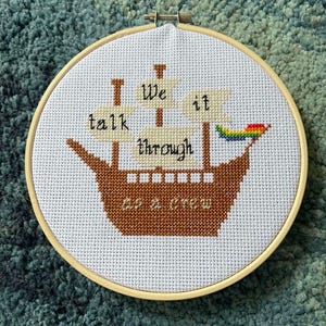 Our Flag Means Death finished cross stitch - Talk It Through As a Crew