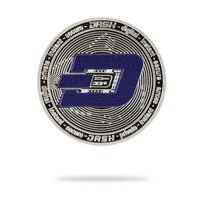 May include: A silver coin with a blue letter D in the centre. The coin has the words "DASH - digital - instant - secure" around the edge.