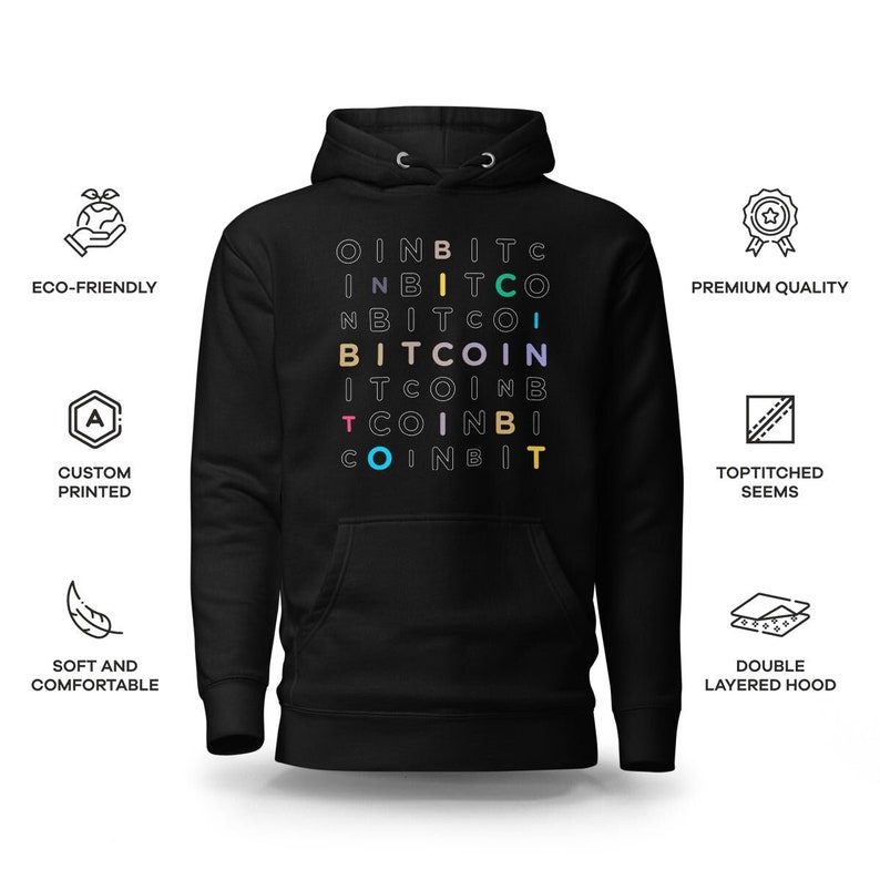 May include: Black hooded sweatshirt with a colorful word puzzle design featuring the word "BITCOIN" repeated in different directions. The hoodie has a double-layered hood and top-stitched seams.