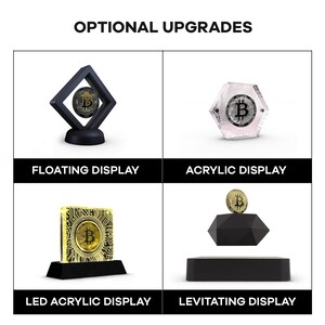 Peut inclure: Quatre options d'affichage diff&eacute;rentes pour une pi&egrave;ce de monnaie Bitcoin. Les options comprennent un affichage flottant, un affichage acrylique, un affichage acrylique LED et un affichage l&eacute;vitant.