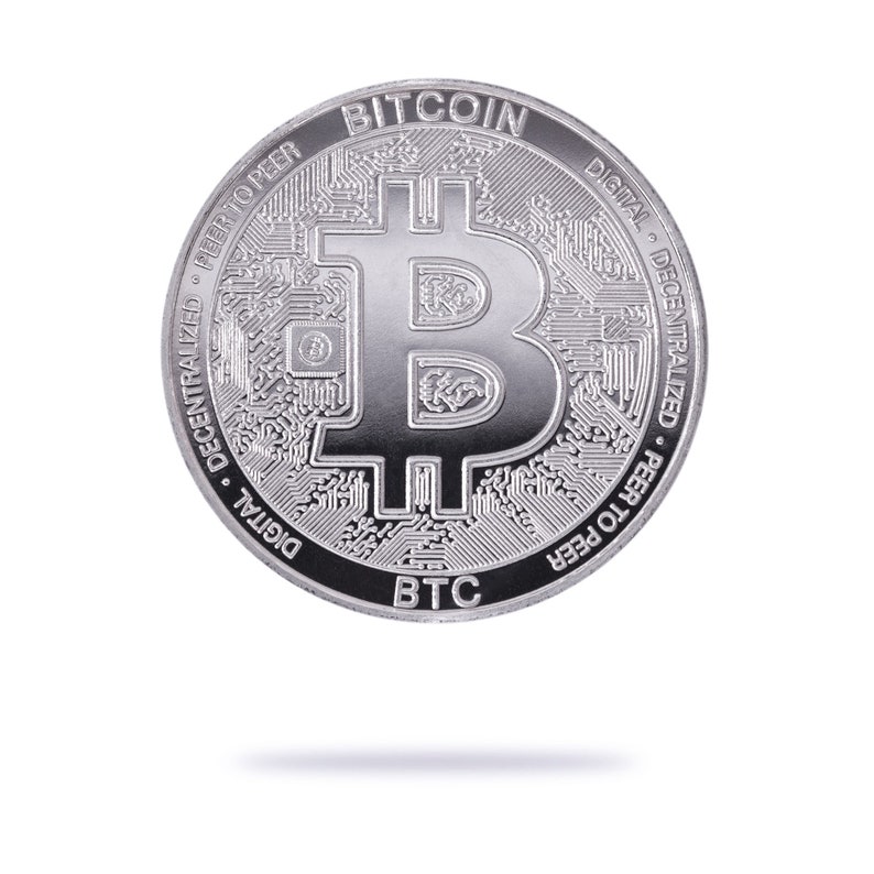 silver Bitcoin (BTC) physical crypto coin by Cryptochips. Collectable Cryptocurrency You Can HODL. Bitcoin merch or gift for crypto enthusiasts.