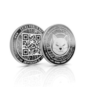 Puede incluir: Dos monedas de plata con un perro Shiba Inu y un código QR. La moneda con el perro tiene el texto "Blockchain. Descentralizado. NFT. SHIBA TOKEN. Community Driven. SHIBASWap. Art Incubator." La moneda con el código QR tiene el texto "SHIBA PUBLIC KEY 110 CRYPTOCHIPS.10 110".