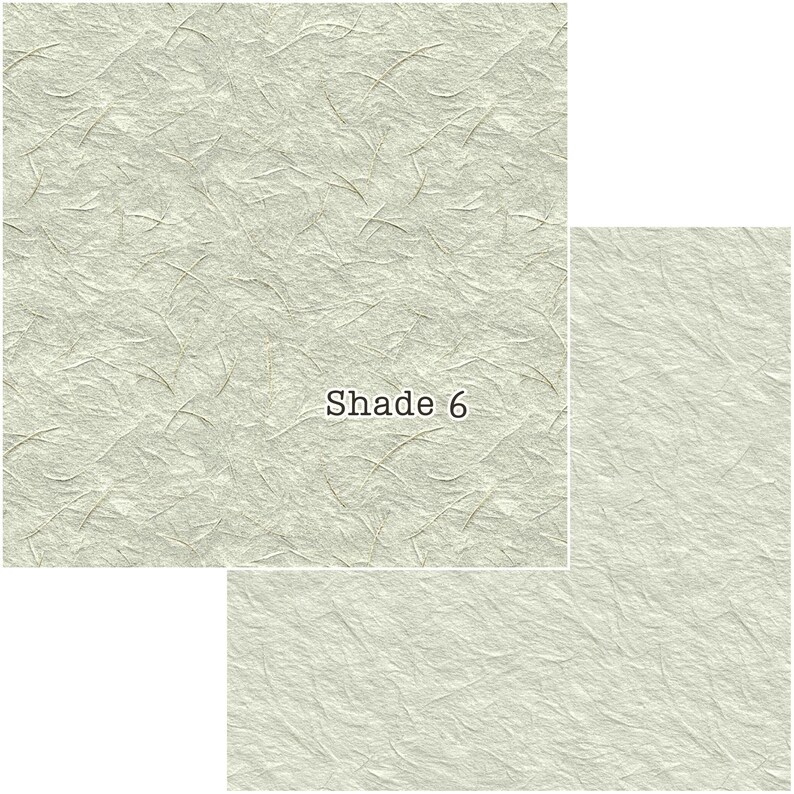 Puede incluir: Papel texturizado blanquecino con fibras visibles y el texto "Shade 6". El papel tiene un aspecto sutil y natural, con una textura ligeramente arrugada. La imagen muestra tres trozos de papel de diferentes tama&ntilde;os.