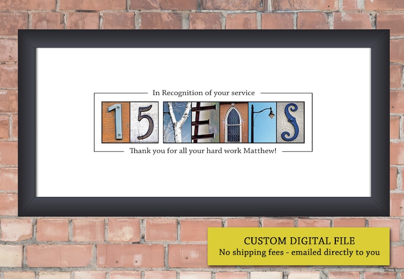 May include: Framed print with the words "15 YEARS" in a unique font, with the text "In Recognition of your service" and "Thank you for all your hard work Matthew!" The print is in a black frame, set against a brick wall.