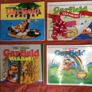 Garfield Treasury Books, Jim Davis Garfield books, First edition Garfield comic books, Garfield Treasury books 1-4 Soft cover books