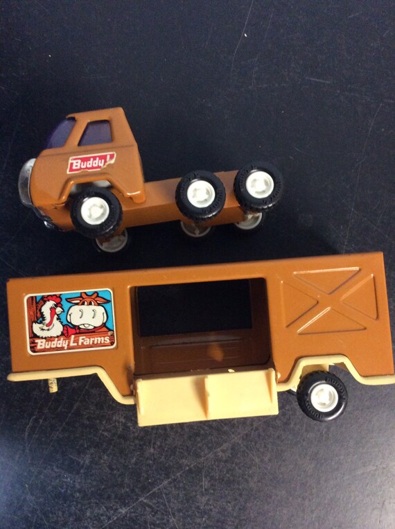 metal toy truck and cattle trailer