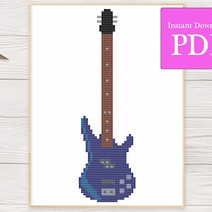 Puede incluir: Un patrón de punto de cruz de una guitarra eléctrica de bajo azul con un cuello marrón y clavijas de afinación negras. El patrón es para descarga digital y está disponible como PDF.