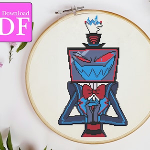 May include: Cross-stitch embroidery of a cartoon character in a wooden hoop. The character is primarily gray, red, and blue, with a bow tie and a top hat. The text "Instant Download PDF" is in a pink box in the upper left corner.