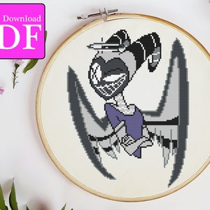 Puede incluir: Bordado de punto de cruz de un personaje de dibujos animados con una amplia sonrisa, cuernos y alas, en tonos grises, negros y morados. El diseño está dentro de un bastidor de bordado de madera. Las palabras "Instant Download PDF" están en un recuadro rosa.