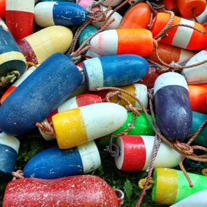 real painted maine lobster buoys...Distressed...  Some are newer than others....Seasonal clearance.. styrofoam 5x11 this listing is for 1