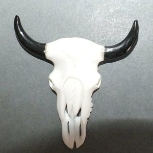 Hand Carved Folk Bone and Horn Pendant with Buffalo Skull Shape from Indonesia
